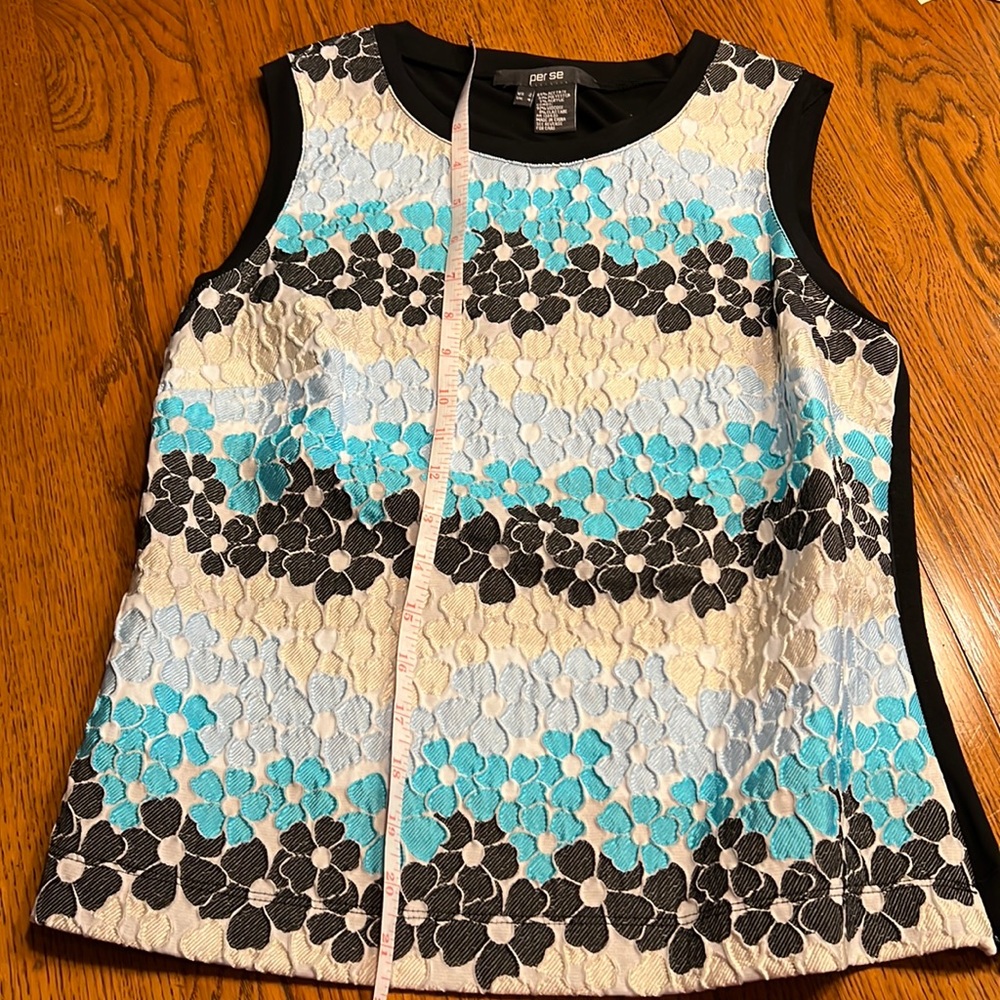 Per Se US size 4 Hyacinth top. Black, light blue, turquoise, & cream. Fair condi
